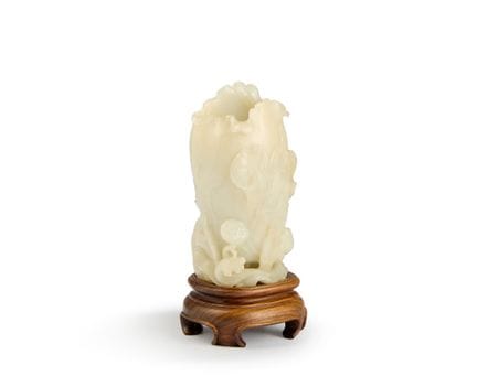 Vase à lotus en jade blanc de Chine

Fin de la dyn