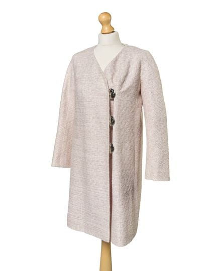 Chanel par Karl Lagerfeld.

Un manteau en tweed cl