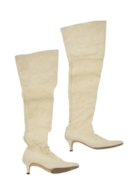 Manolo Blahnik.

Ein Paar oberschenkellange Stilet