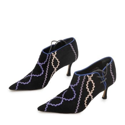 Manolo Blahnik.

Ein Paar Vintage-Stiefeletten aus