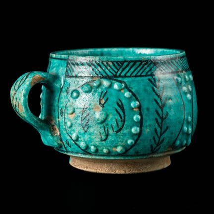 Tazza in ceramica smaltata di colore blu turchese,