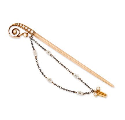 Une épingle à cravate édouardienne en or 15 carats