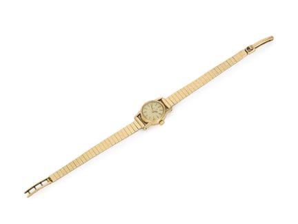 Omega. A small sized 9ct gold manual wind bracelet
