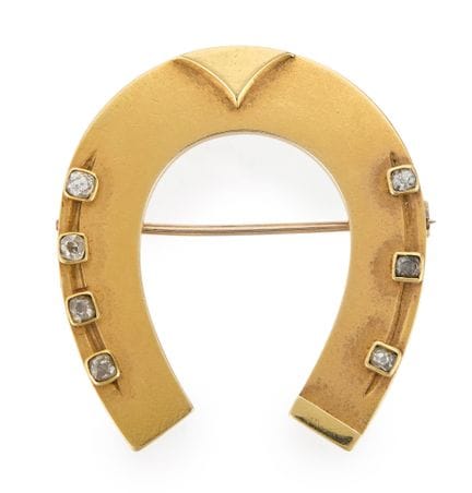 Broche victorienne en forme de fer à cheval en or,