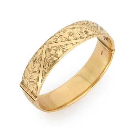 Bracelet rigide en or 9 carats gravé, de forme ova
