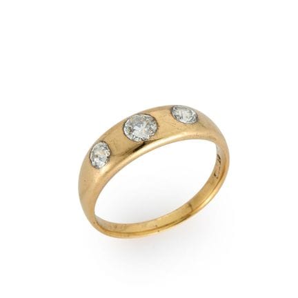 Bague en or 18 carats sertie de trois diamants, da