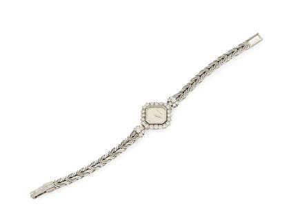 Bueche-Girod/Roy King. An 18ct white gold diamond 