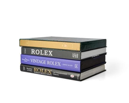 Un lot de quatre ouvrages consacrés à Rolex, compr