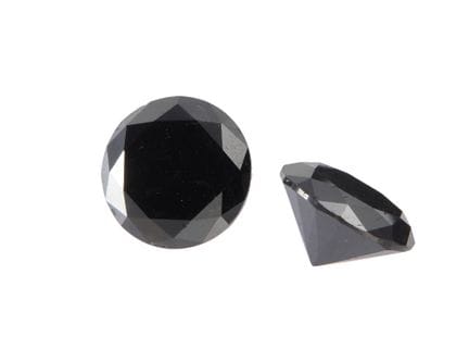 Deux diamants noirs traités, non sertis, de taille