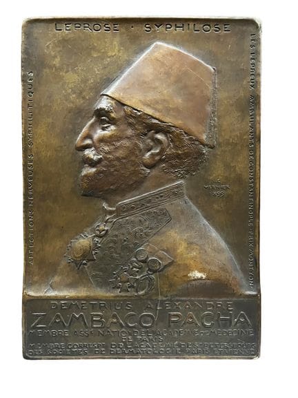Commemorative plaque made of metal with a bronze-l