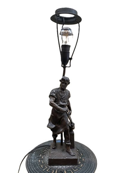 Table lamp made of patinated pewter with a bronze-