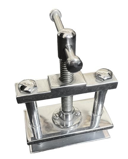 Set including a chrome-plated metal press. Height: