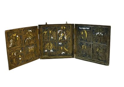 A bronze and enamel travel triptych depicting scen
