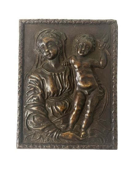 Rectangular bronze bas-relief plaque with a brown 