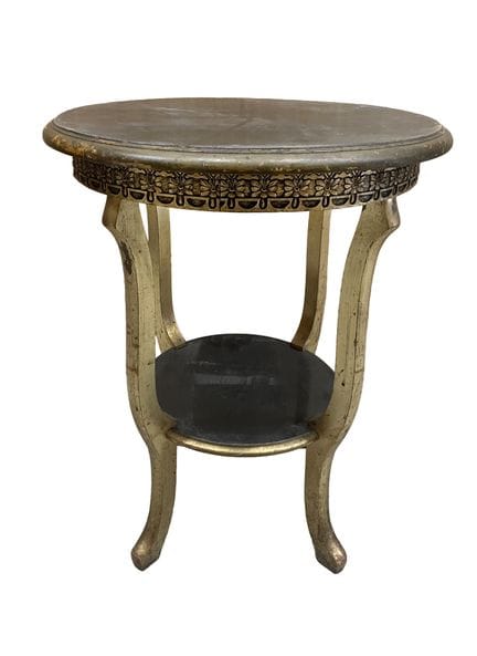 Round side table made of carved wood, gilded and l