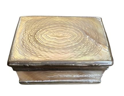 Mother-of-pearl box with a cage-like design. Metal