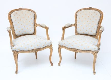 Pair of natural wood cabriolet armchairs, molded a