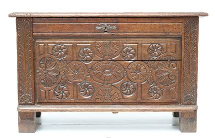 Natural wood chest, molded and carved with a front