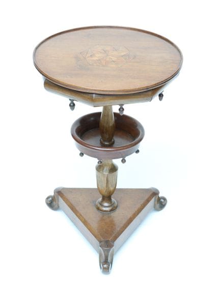 Natural wood side table with a top featuring geome