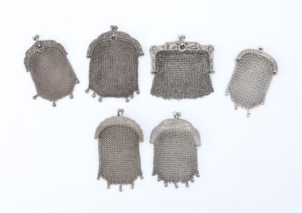 Set of six silver pouches (800 mil.) featuring var