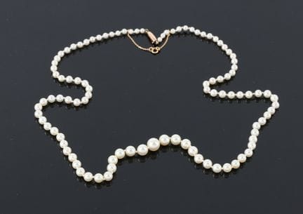 Cascading cultured pearl necklace with an 18-karat