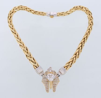 Stately two-tone gold necklace featuring a pharaoh