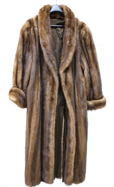 Anonymous
Pastel-colored mink coat with a loose sh