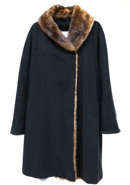 Max Mara.
Black coat with a shawl collar trimmed w