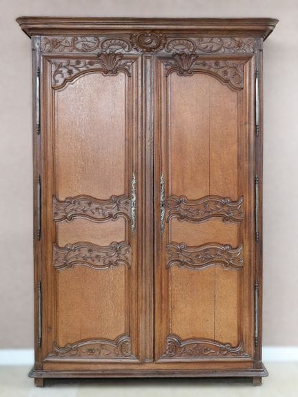 "Cocoa Pod" cabinet made of carved oak with two-pa