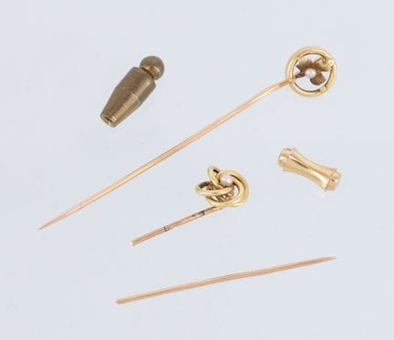Set of two 18-karat yellow gold (750) tie pins (ea