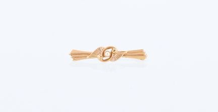 18-karat yellow gold (750) hairpin brooch (eagle h