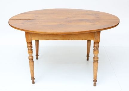 Oval walnut table with four baluster legs (extensi
