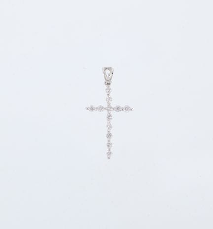 Small 18-karat white gold cross (750 parts per tho