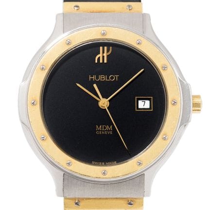 HUBLOT MDM 石英女士腕表，型号 14012。不锈钢表壳，表耳及表圈采用 18K 黄金材质。