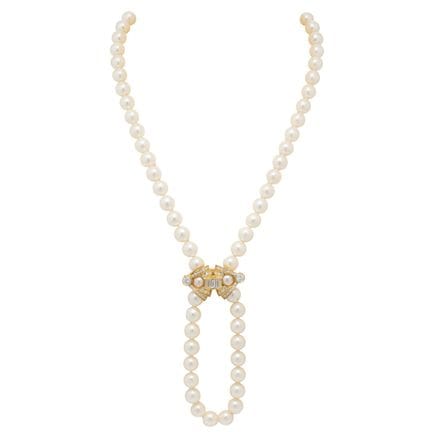 Lunga collana di perle con prolunga, composta da 9