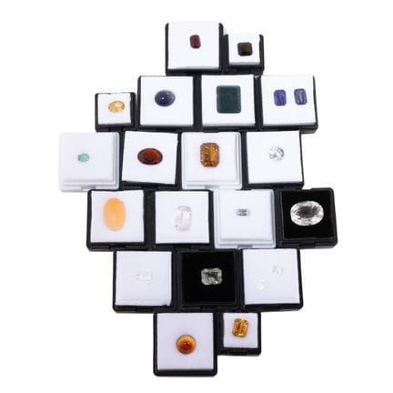 Sammlung aus 20 Edelsteinen,  darunter Topas, gelb