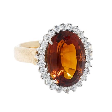 Anello con citrino da circa 7,8 ct circondato da 2
