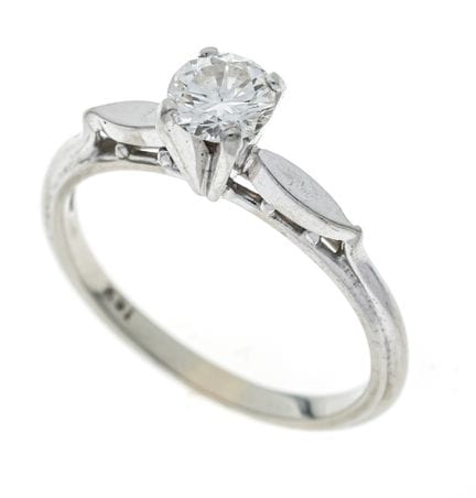 Bague solitaire en or WG 750/000 sertie d'un brill