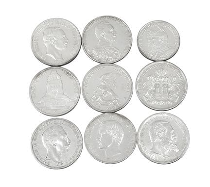 9 silver coins from the German Empire, circa 1900.