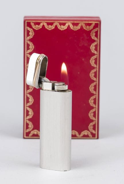 Encendedor Cartier, década de los 90, metal platea