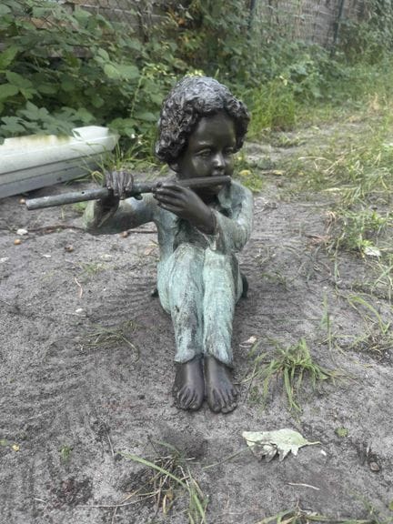 Statue de jardin représentant un flûtiste, XXIe si