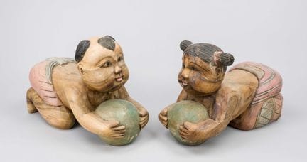 Par de figuras de almohada, China, siglo XX, mader