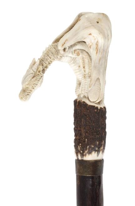 Figurative walking stick
20th century, carved stag
