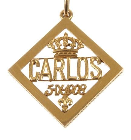 Pendentif en or de la maison royale espagnole
comm