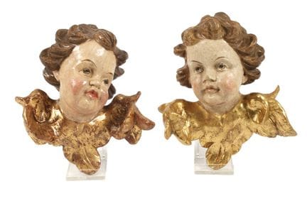 Pair of Baroque angel heads
18th century, carved w