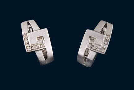 Paire de boucles d'oreilles en diamant

Or blanc 5