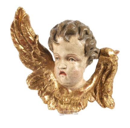 Carved angel’s head
19th century, carved from hard