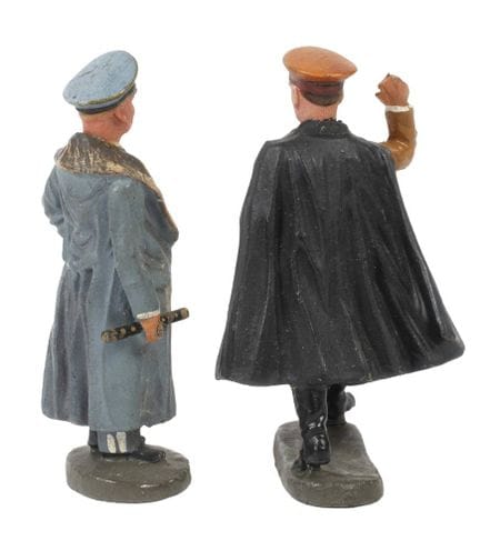 Deux figurines en Elastolin avec une tête en porce