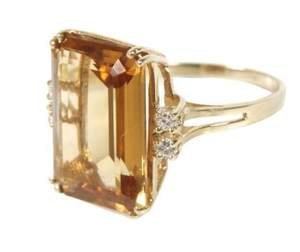 Anillo de mujer con citrino y diamantes
hacia el a