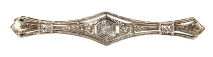 Broche de diamantes 
hacia 1920, oro amarillo con 